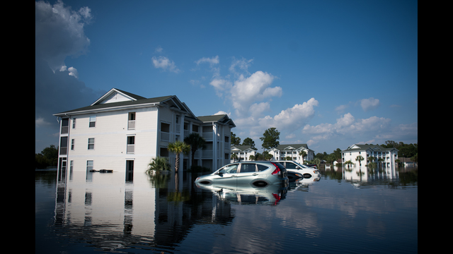 Apartment buildings at Aberdeen Country Club are inundated by floodwaters caused by Hurricane Florence in Longs, South Carolina. Floodwaters are expected to rise through the weekend in the area. (Photo by Sean Rayford/Getty Images)