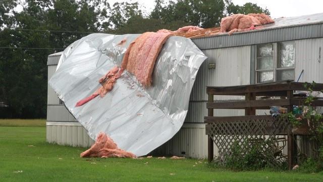 Winds have ripped the roof off of a mobile home in Clayton