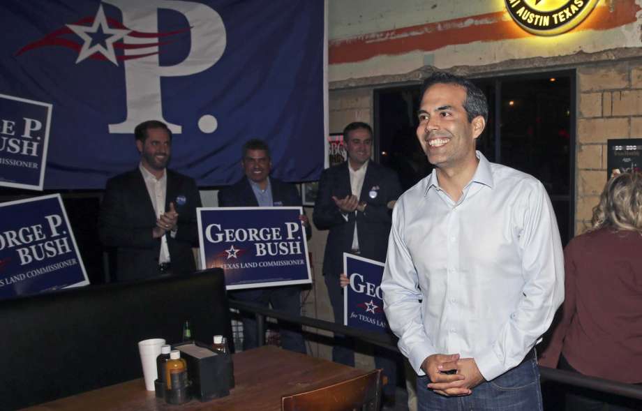 George P. Bush walks in the door at Stiles Switch BBQ and hears loud applause as he holds his election night watch party in Austin on March 6, 2018. Photo: Tom Reel, Staff / San Antonio Express-News / 2017 SAN ANTONIO EXPRESS-NEWS