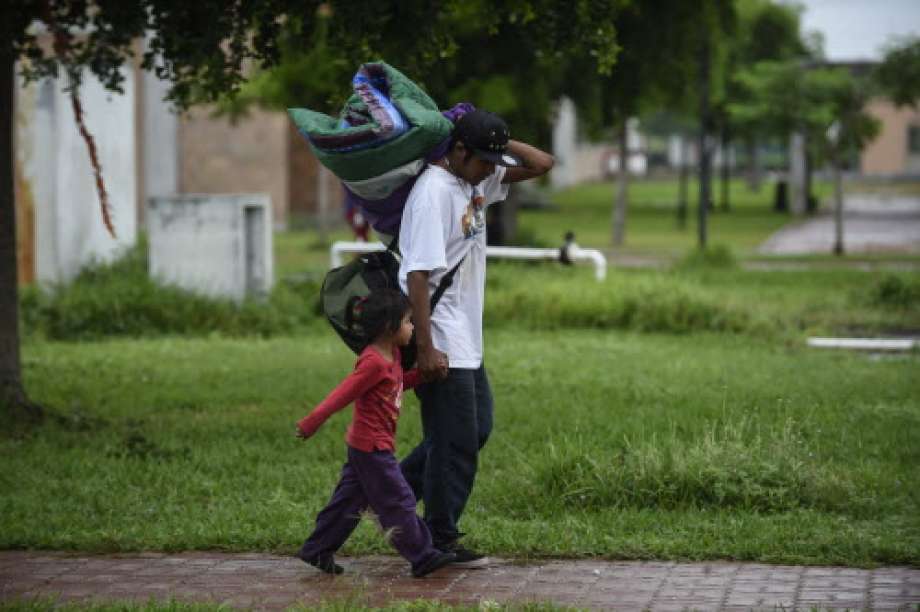 People arrive at an improvised shelter in Escuinapa, Sinaloa state, Mexico, on October 23, 2018, before the arrival of Hurricane Willa.  Photo: ALFREDO ESTRELLA, AFP/Getty Images / AFP or licensors