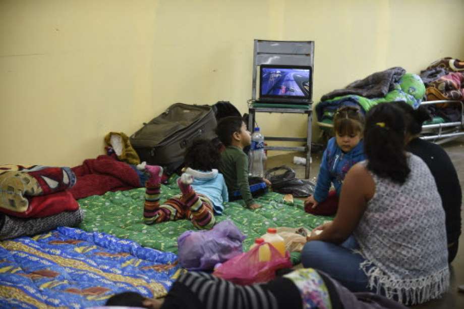 Children gather with their families at an improvised shelter in Escuinapa, Sinaloa state, Mexico, on October 23, 2018, before the arrival of Hurricane Willa.  Photo: ALFREDO ESTRELLA, AFP/Getty Images / AFP or licensors