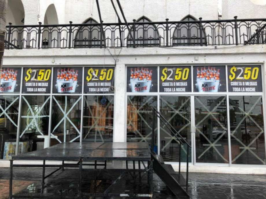 The windows of a restaurant are protected with tape against strong winds, before the arrival of Hurricane Willa, in Mazatlan, Sinaloa state, Mexico on October 23, 2018.  Photo: DANIEL SLIM, AFP/Getty Images / AFP or licensors