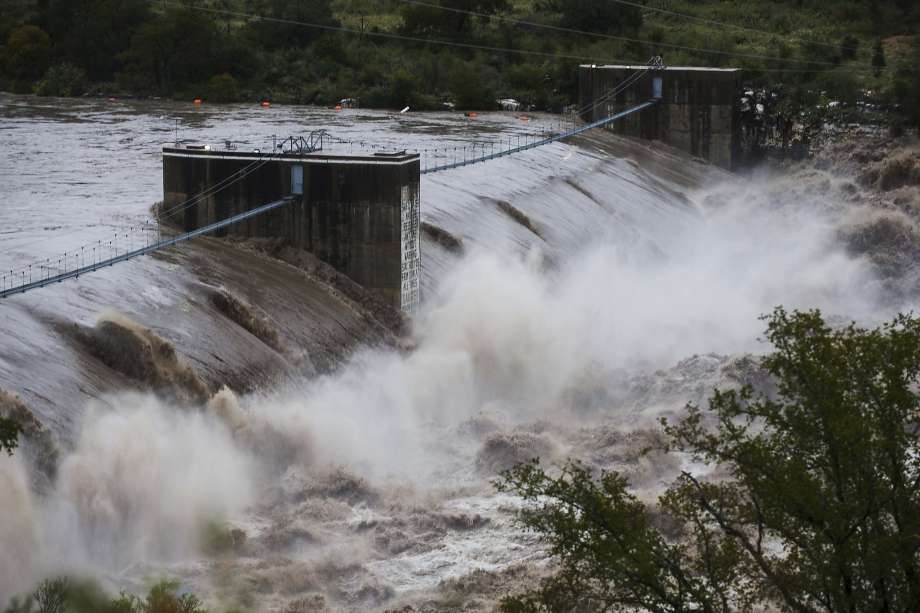 AFTER: Water from the Colorado River pours over the Max Starcke Dam, Tuesday Oct. 16, 2018, in Marble Falls. Photo: Amanda Voisard, Associated Press