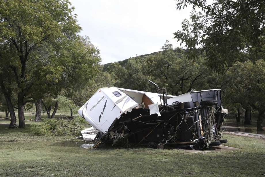 A crumpled recreational vehicle lies on the grounds of the Kimble County River Park in Junction on Monday. Photo: Jerry Lara /Staff File Photo / © 2018 San Antonio Express-News