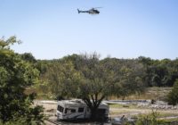 Search resumes for 2 swept away in Texas floods