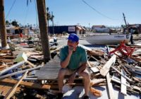 Hurricane survivors wander debris, search for the missing