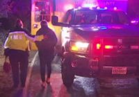 Stranded woman rescued from rushing water