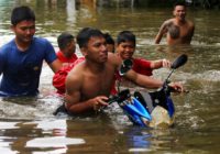 Death toll from Indonesian floods and landslides rises to 26