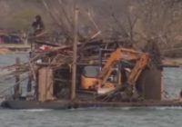 Piles of debris being fished out of Lake LBJ