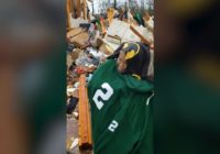 Woman comforted in ruins of home destroyed by Alabama tornado