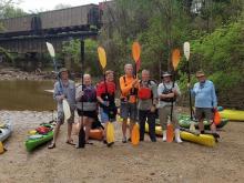 Richard Adkins paddles the Neuse