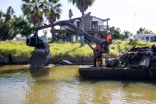 Removal of the last remaining amounts of hazardous debris from waters in Copano Cove and Copano Ridge and select portions of Salt Lake deposited by Hurricane Harvey began Monday, November 5, 2018 by Aransas County. Some items that could be found in the waterways include automobiles, trucks, motorcycles and similar vehicles; sunken and submerged vessels; large appliances such as washing machines, dryers, dish-washing machines, refrigerators, hot water heaters, and similar household appliances or commercial machine items of comparable cubic dimensions; sunken, submerged, and partially collapsed structures, decks, docks, balconies, and similar man-made structures. 