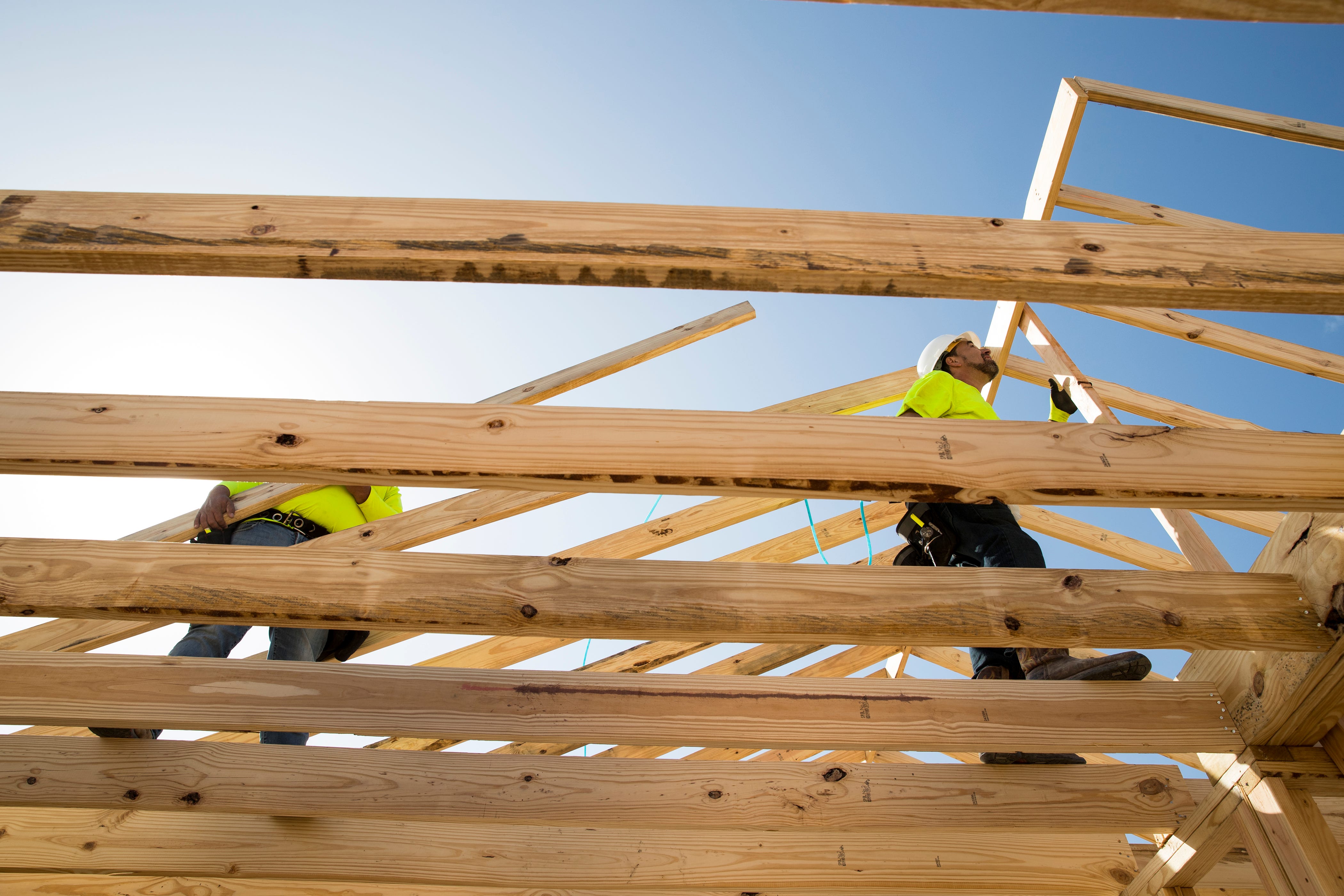 Gerardo Gonzalez (left) and Alex Leal, with the Louisiana-based Bautista Group, work on a home being rebuilt under the Homeowner Assistance Program in Rockport on Tuesday, January 22, 2019. The home will be built in 18 days from start to finish and will replace a home destroyed by Hurricane Harvey. The General Land Office has allocated more than a billion dollars to the program, which will help thousands of Texans who were affected by Hurricane Harvey recover.