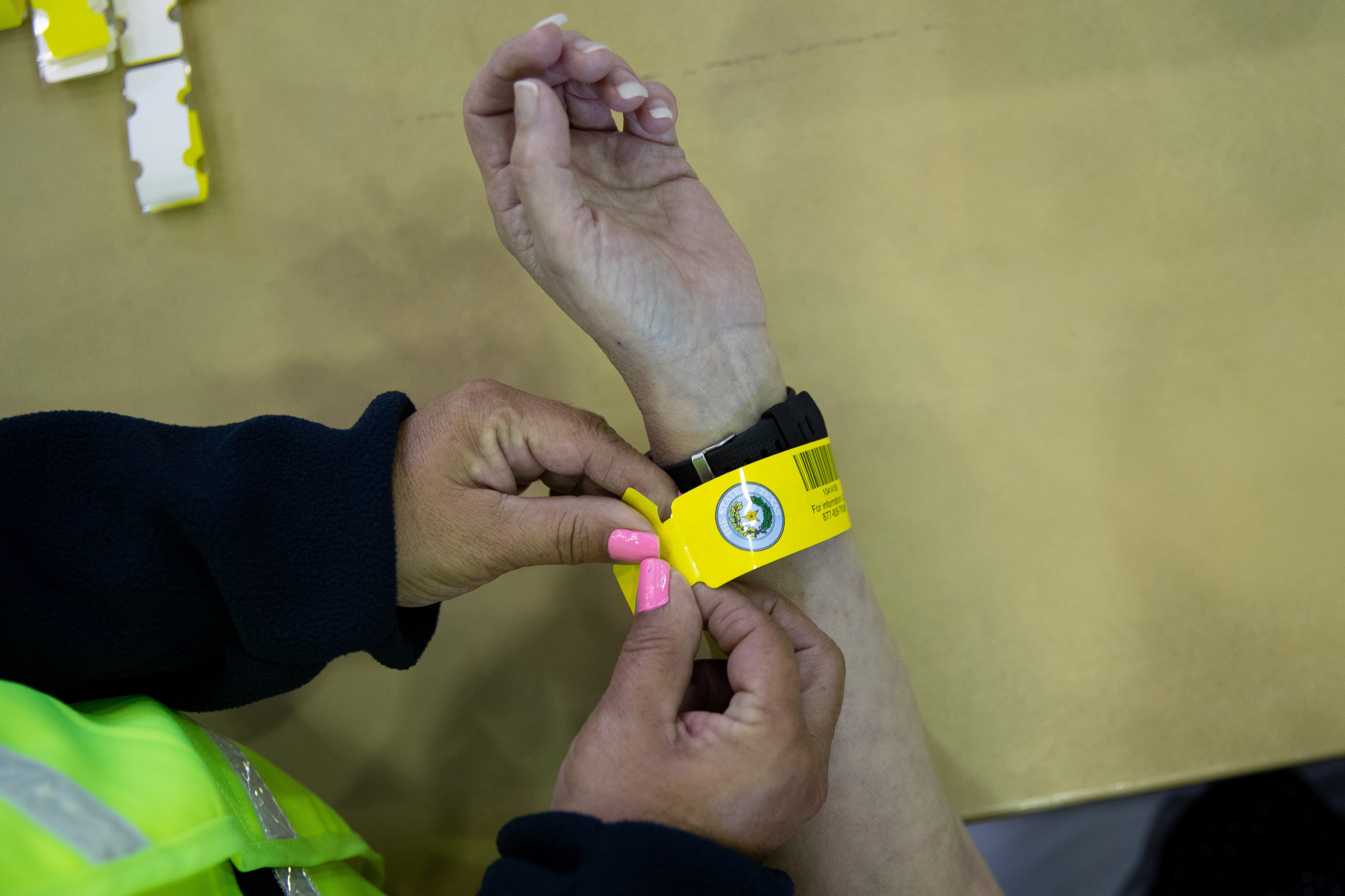 Members of the Texas State Guard take peoples information as the City of Corpus Christi,Texas Department Emergency Management and other agencies conduct a Hurricane evacuation drill at the Cabaniss natatorium on Friday, June 21, 2019.