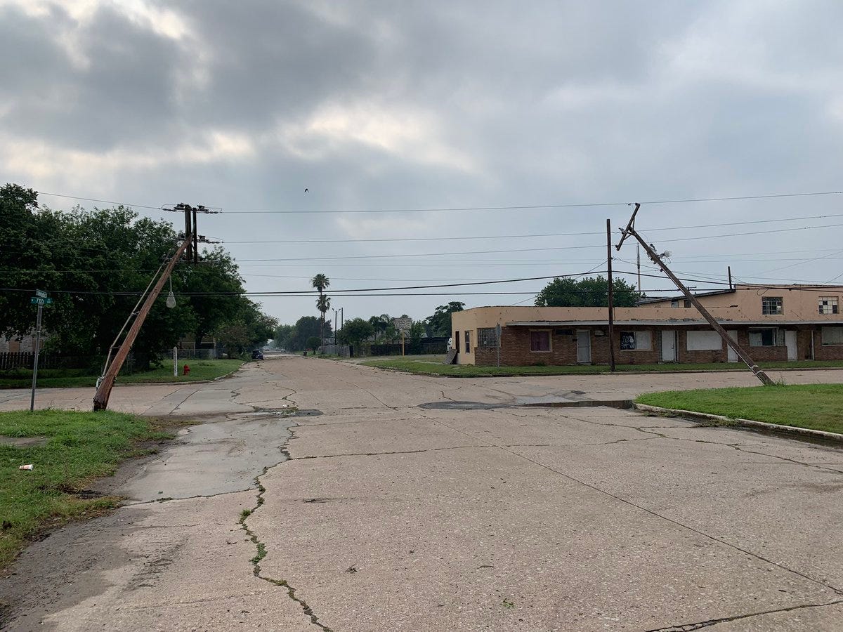 Utility poles were knocked over and are leaning precariously at Henrietta and Seventh streets. One pole looks like it’s been snapped by the storm’s winds on Friday, June 6, 2019.