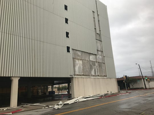 The debris on the ground outside the uptown post office was removed quickly after Hurricane Harvey. But the above-ground view from Buffalo Street a year and a half later hasn't changed.