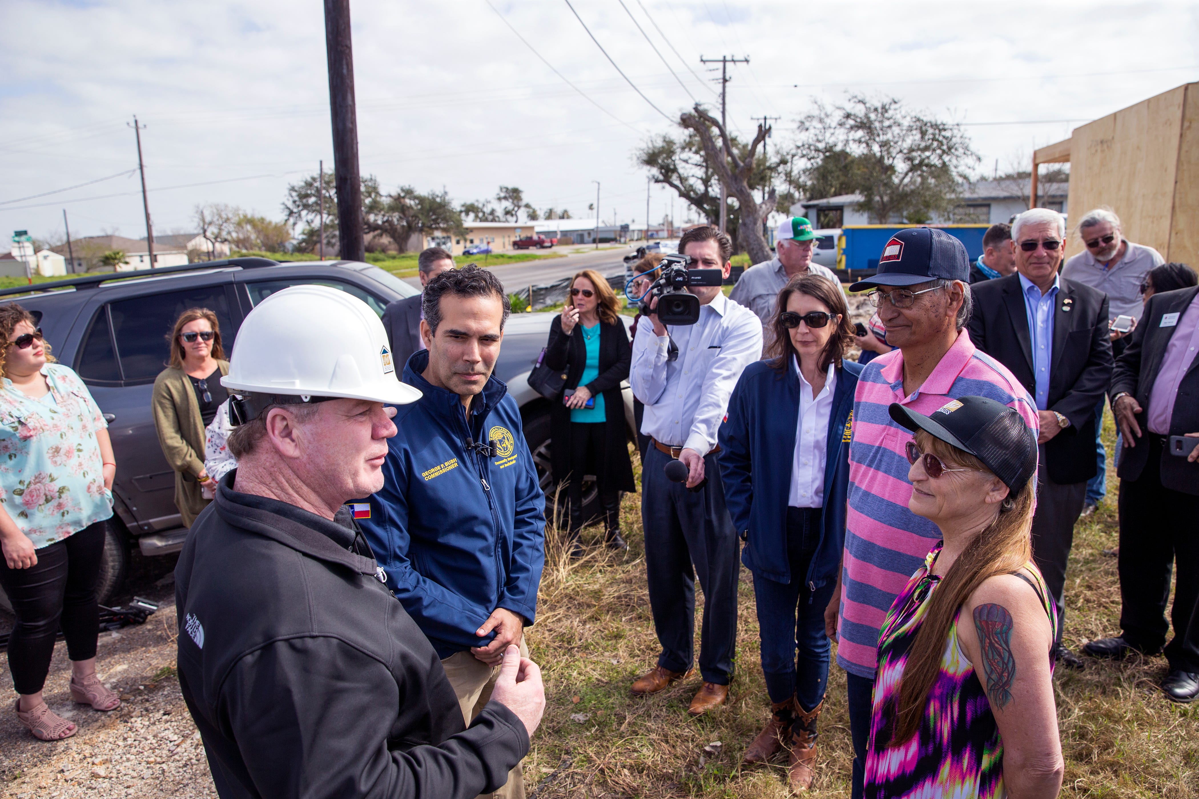 Steve Mataro (clockwise from left), owner of DSW Homes, Texas Land Commissioner George P. Bush and Juan and Juanita Rodriguez meet outside what will be the Rodriguez' new home in about 10 days during a walkthrough showing progress on Tuesday, January 22, 2019 in Rockport. Their home was damaged by Hurricane Harvey and was beyond repair, under the Homeowner Assistance Program they are getting the help they needed to get their home rebuilt. The General Land Office has allocated more than a billion dollars to the program, which will help thousands of Texans who were affected by Hurricane Harvey recover.