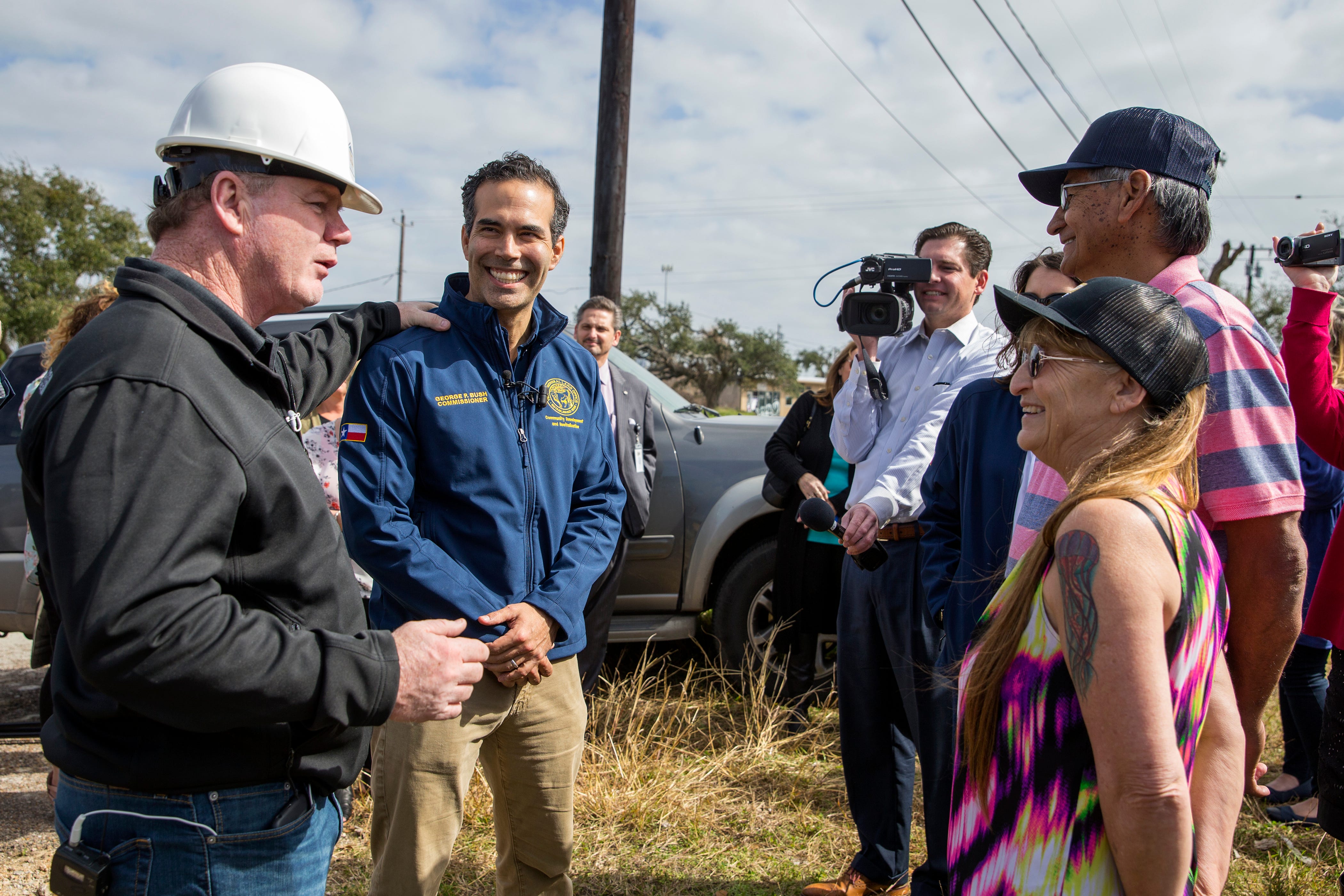 Steve Mataro (clockwise from left), owner of DSW Homes, Texas Land Commissioner George P. Bush and Juan and Juanita Rodriguez meet outside what will be the Rodriguez' new home in about 10 days during a walkthrough showing progress on Tuesday, January 22, 2019 in Rockport. Their home was damaged by Hurricane Harvey and was beyond repair, under the Homeowner Assistance Program they are getting the help they needed to get their home rebuilt. The General Land Office has allocated more than a billion dollars to the program, which will help thousands of Texans who were affected by Hurricane Harvey recover.