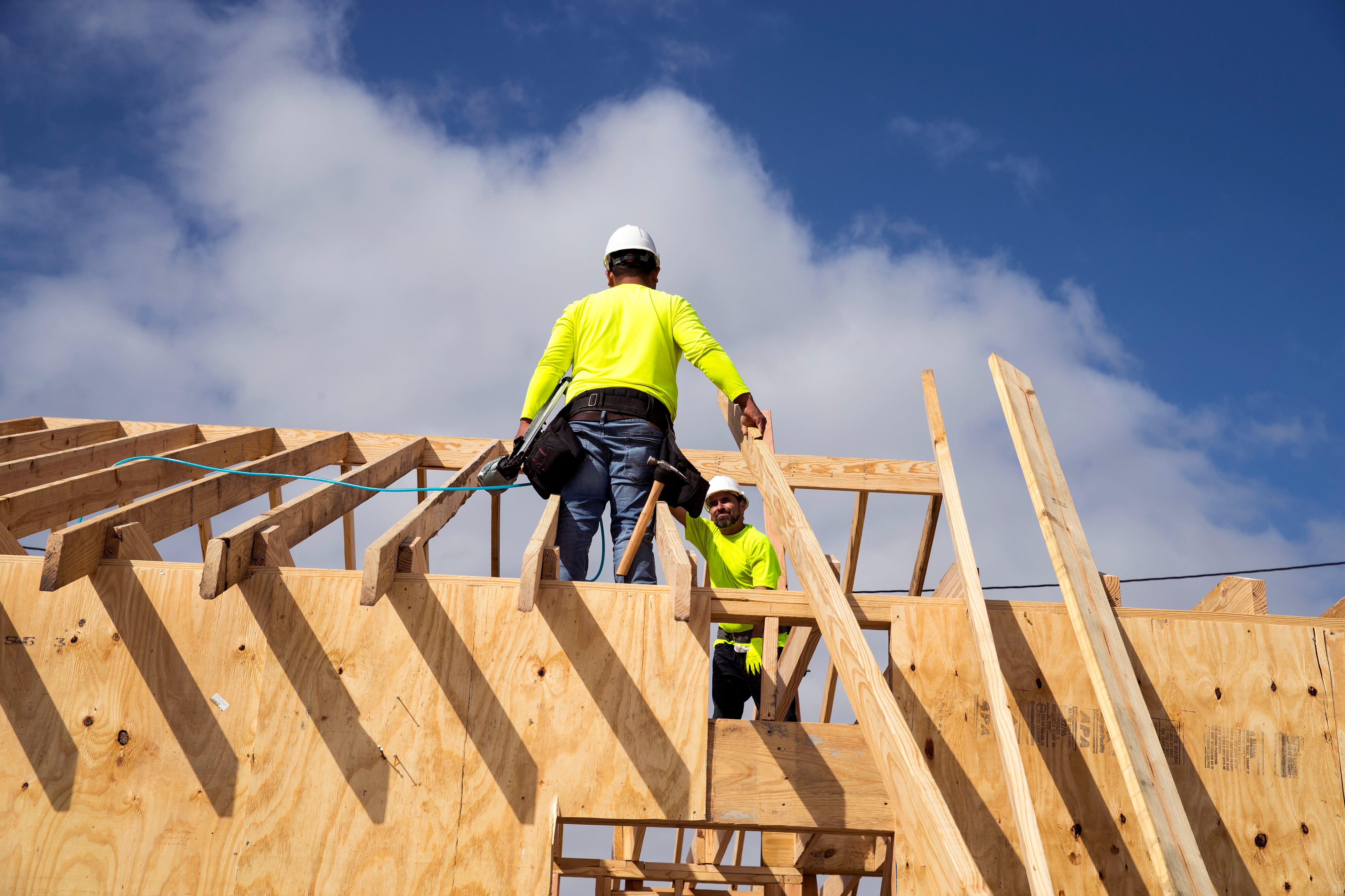 Gerardo Gonzalez (left) and Alex Leal, with the Louisiana-based Bautista Group, work on a home being rebuilt under the Homeowner Assistance Program in Rockport on Tuesday, January 22, 2019. The home will be built in 18 days from start to finish and will replace a home destroyed by Hurricane Harvey. The General Land Office has allocated more than a billion dollars to the program, which will help thousands of Texans who were affected by Hurricane Harvey recover.