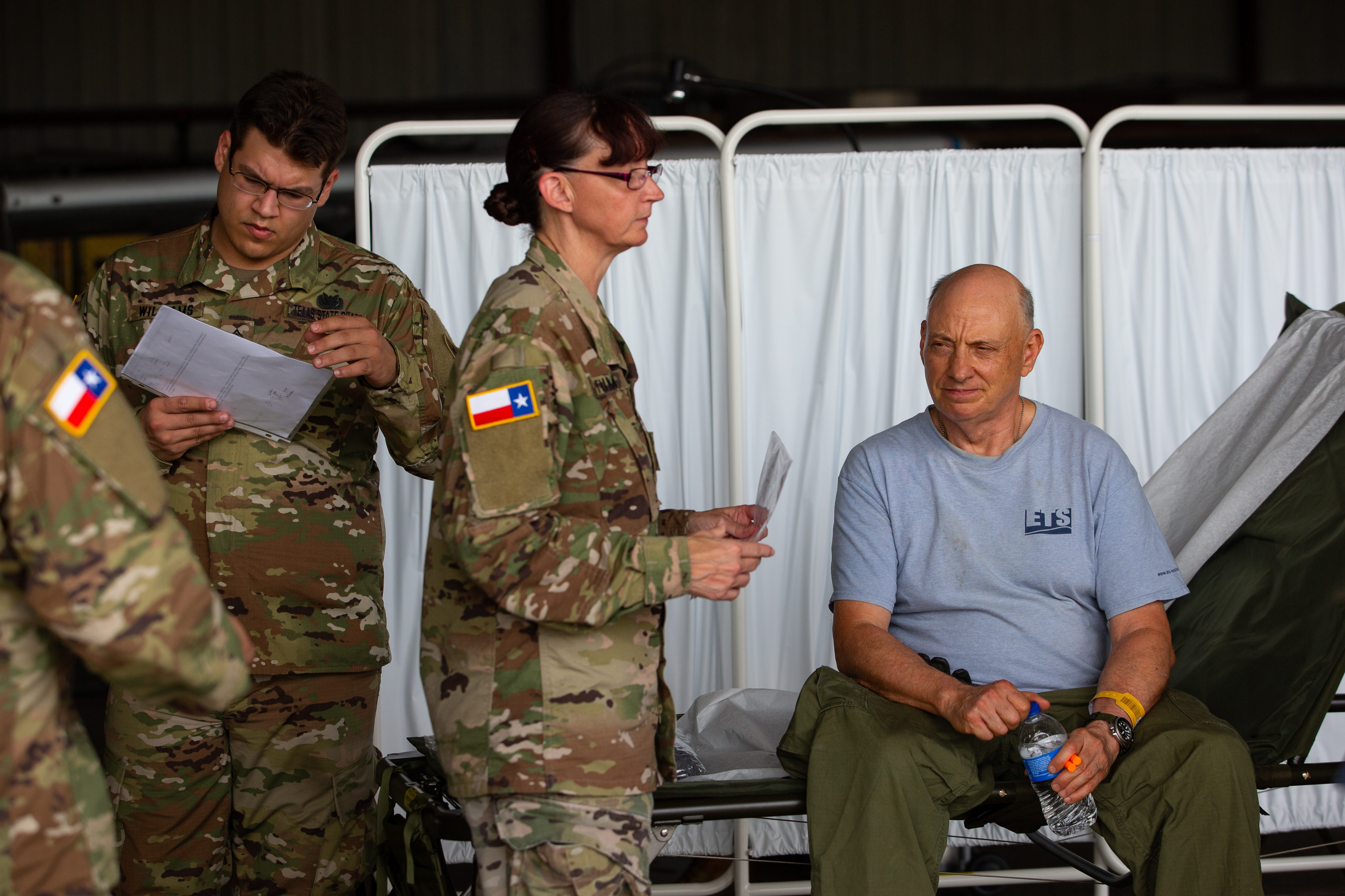 Mock patient are checked during a Texas Air National Guard hurricane air emergency evacuation drill at the Corpus Christi International Airport on Wednesday, June 12, 2019. 