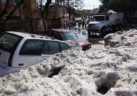 Freak summer hailstorm blankets Mexican city in ice