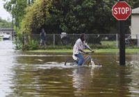 Weakened Barry still poses flood, tornado risks