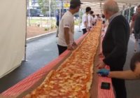 Australian restaurant bakes pizza longer than a football field to raise money for firefighters battling wildfires