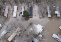 Soggy neighborhoods under flash-flood warning in Mississippi
