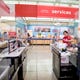 Alina Alvarez, bags groceries at H-E-B Plus on Friday, April 3, 2020. H-E-B has put several measures in place to encourage social distancing and protection for its employees and customers. Each store within the Corpus Christi area has expanded shielding around the checkout area for the cashier and baggers as of Friday.