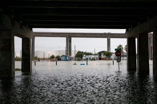 High water fills the streets on Corpus Christi North Beach morning after Hurricane Hanna Sunday, July 26, 2020. 