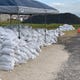 The City of Corpus Christi distributes bags early Friday, July 24, 2020 to help residents prepare for flooding from Tropical Storm Hanna. The storm was expected to make landfall on Saturday along the Gulf coast.
