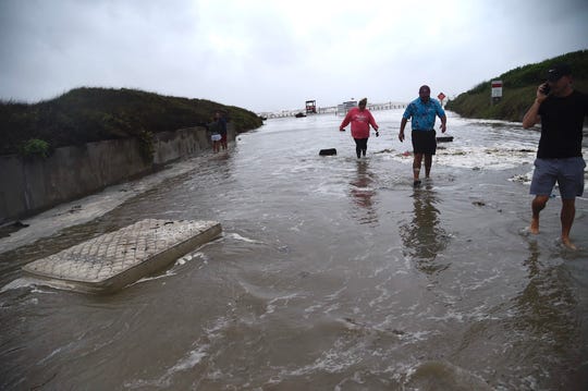 Debris is seen coming onto the shore ahead of Hurricane Hanna in Port Aransas.