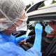 A testing center was set up in the back of a hospital in Agen so people being tested wouldn't have to leave their cars.
