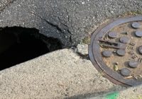 Heavy rain causes flooding in Myers Park due to possible sinkhole