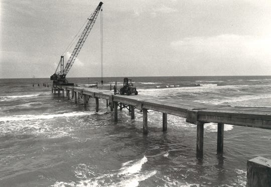 Bob Hall Pier under construction on Padre Island on Oct. 7, 1982. The original wooden pier was wiped out by Hurricane Allen in August 1980 and was rebuilt as a concrete structure about 6 feet higher than the original.