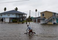 See waves crash and storm surge cause flooding as Tropical Storm Beta makes landfall in Texas