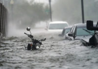 Sally weakens but still dumping rain; Rivers threaten flooding
