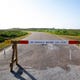 A barricade blocks beach Access Road 6 on Thursday, July 16, 2020. Nueces County Judge Barbara Canales issued an order prohibiting vehicle access on beaches until August 1.