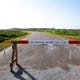 A barricade blocks beach Access Road 6 on Thursday, July 16, 2020. Nueces County Judge Barbara Canales issued an order prohibiting vehicle access on beaches until August 1.