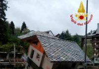 Mountain flooding kills 2 in Italy, traps dozens in France