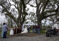Hurricanes, virus can't stop Louisiana couple's wedding
