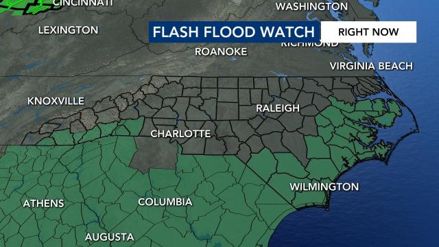 A flash flood warning has been issued for communities near the coast and in the mountains.