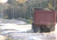 'Hope and pray for the best.' Small eastern North Carolina town fights flooding