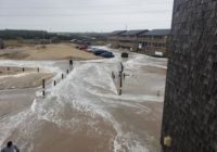 Dune collapses, roads and ferries close as flooding, high winds impact NC coast