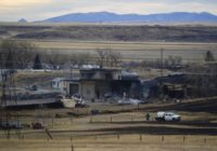 Wildfire burns into central Montana town, destroys houses