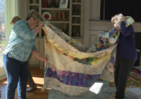 One year after deadly tornado, quilters patching up their community.