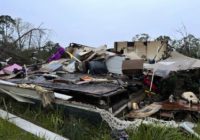Residents clear storm debris as more severe weather looms