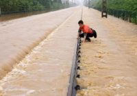 South China floods force tens of thousands to evacuate