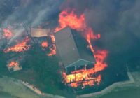 Evacuation order lifted as Texas wildfires burn amid heat