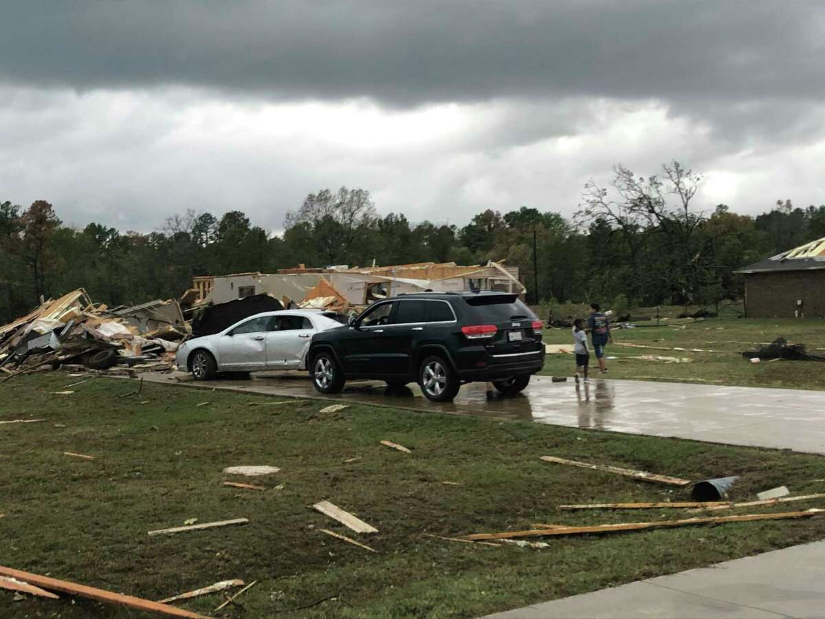 Scenes of devastation are visible in all directions along Lamar County Road 35940, west of State Highway 271, after a massive tornado hit the area, causing extensive damage and destroying an unknown number of homes, Friday, Nov. 4, 2022 in Powderly, Texas. (Jeff Forward/The Paris News via AP)